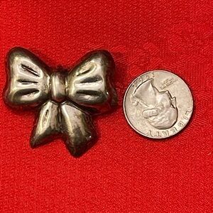 Elegant Silver Bow Brooch